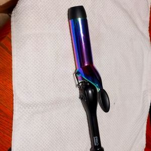 PRO beauty curling iron for hair care.